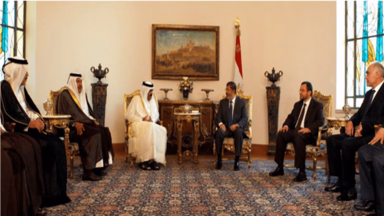 حمد بن خليفة ومحمد مرسي